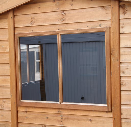 A 35in fixed shed window in Redwood